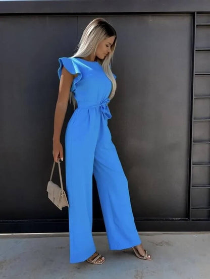 Noélia - Maxi-Overall aus Satin mit kurzen Ärmeln, welligen Schultern, Stehkragen, Taillengürtel und weitem Hosenbein