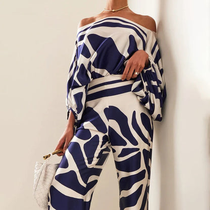 Maëlys - Elegantes Zweiteiliges Ensemble für Frühling und Sommer mit Weiten Ärmeln und Off-Shoulder Design, Hochtaillierte Palazzo-Hosen und Glänzenden Mustern